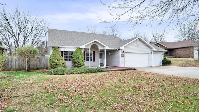 ranch-style house with a garage and a front lawn