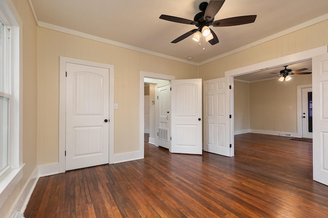 unfurnished bedroom with ceiling fan, crown molding, and dark hardwood / wood-style floors