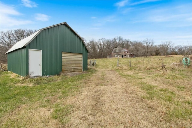 view of outbuilding featuring a garage