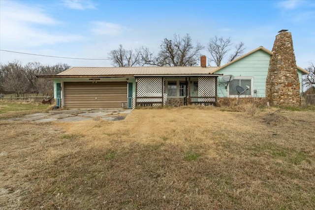 ranch-style home featuring a garage