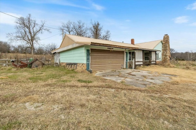 view of front of property featuring a patio