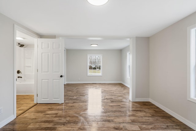 spare room featuring hardwood / wood-style floors