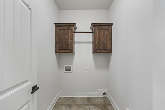 laundry room with hookup for a washing machine, light tile patterned floors, cabinets, and hookup for an electric dryer