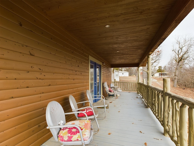 deck featuring covered porch