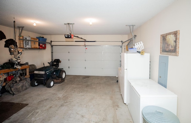 garage featuring electric panel, white fridge, a garage door opener, and fridge