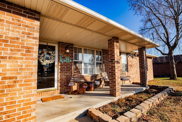 doorway to property featuring a porch