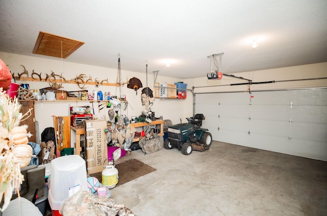 garage featuring a garage door opener