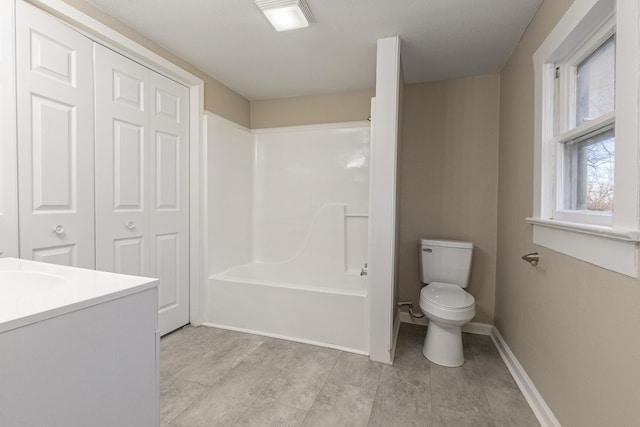 bathroom with hardwood / wood-style floors, vanity, and toilet