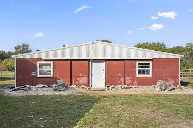 view of outdoor structure with a yard