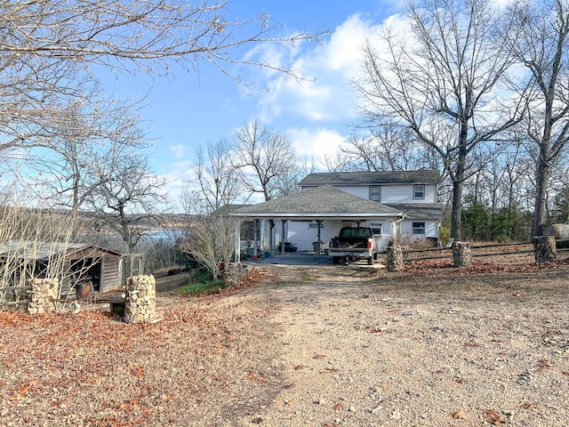 view of front of home featuring a carport