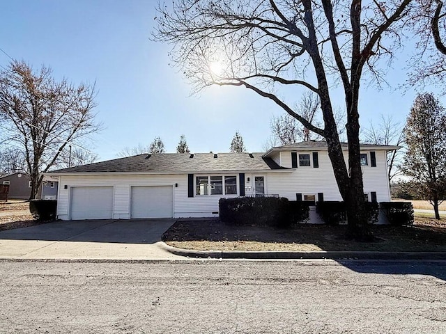 tri-level home featuring a garage