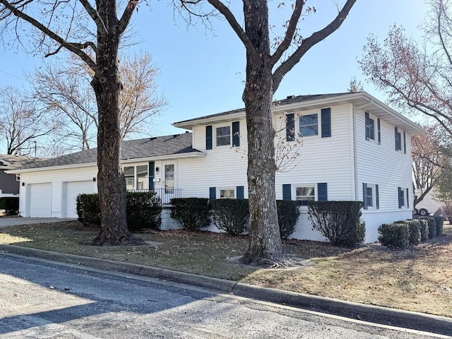 split level home with a garage