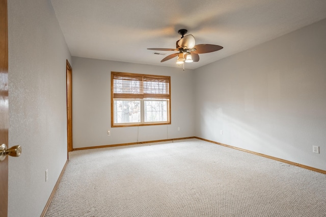 1204 Lake Road Dr, Cassville, MO 65625 - unfurnished room featuring light colored carpet and a ceiling fan