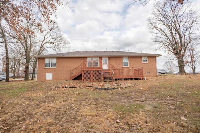 rear view of house with a deck