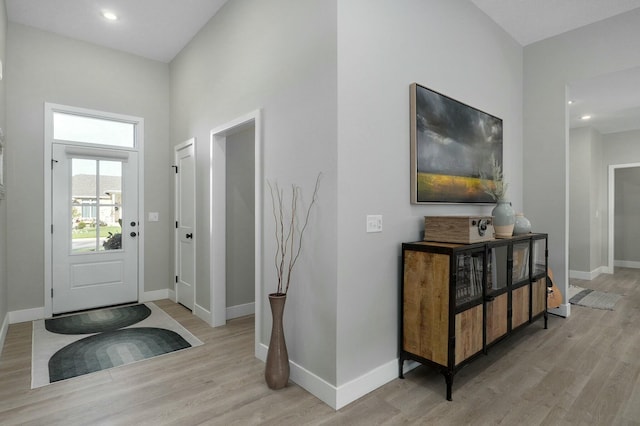 foyer entrance featuring light hardwood / wood-style flooring