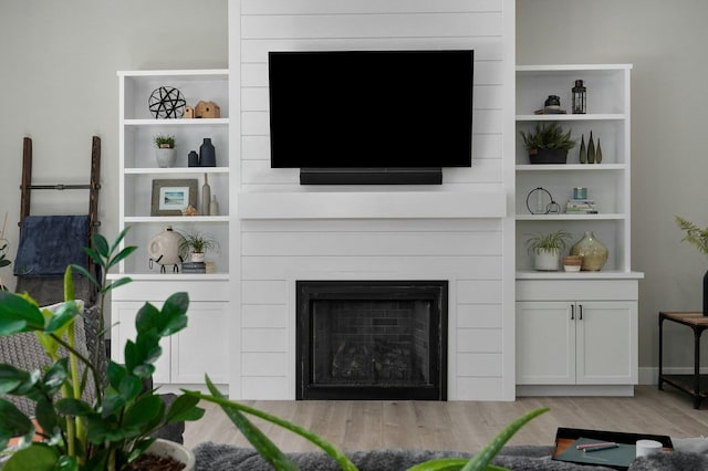 living room with light hardwood / wood-style flooring