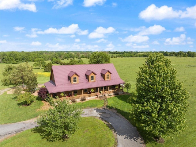 birds eye view of property featuring a rural view