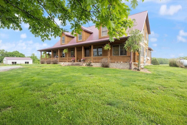 view of front facade featuring a front yard and a porch