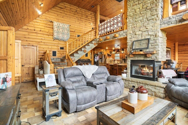 living room featuring a stone fireplace, wooden ceiling, high vaulted ceiling, and log walls