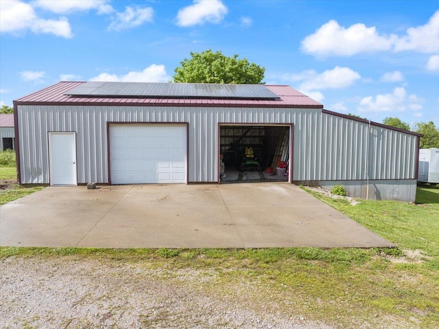 garage featuring solar panels