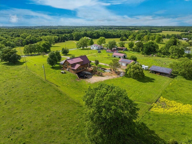 birds eye view of property featuring a rural view