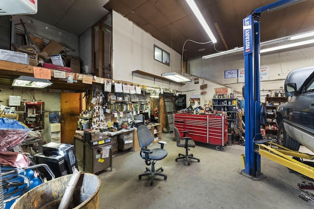 garage with a workshop area