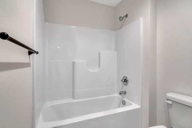 full bathroom featuring toilet and shower / bathing tub combination