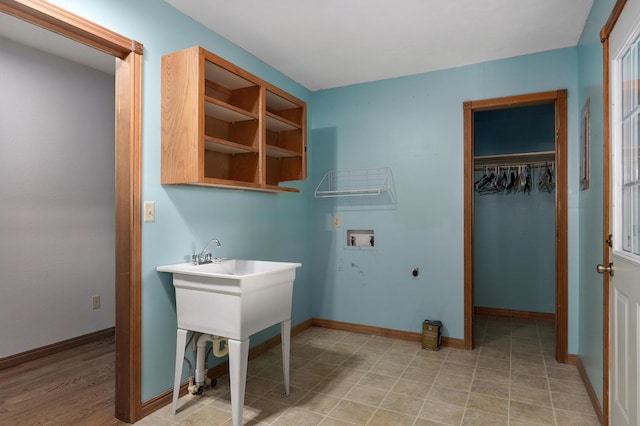 clothes washing area featuring hookup for an electric dryer and washer hookup