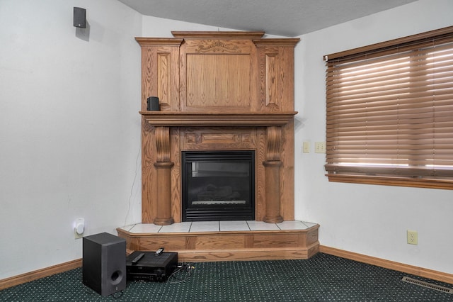 room details with carpet and a fireplace