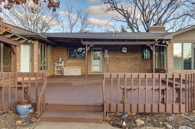 exterior space with a wooden deck