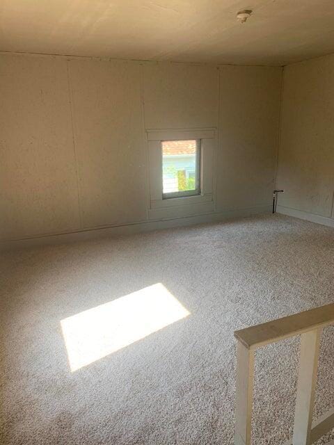 empty room with carpet floors