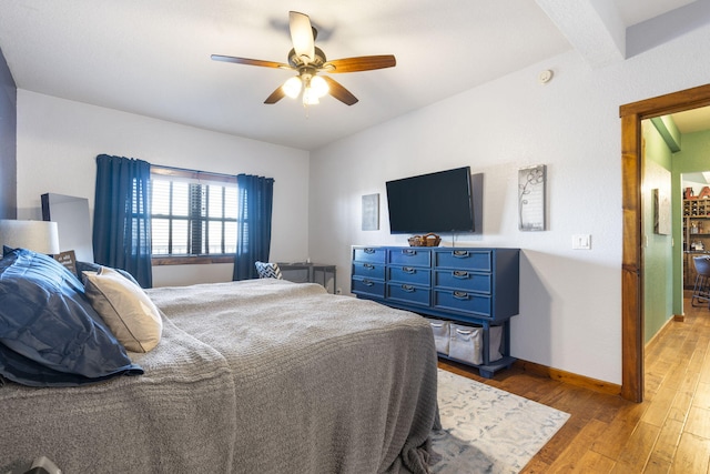 bedroom featuring ceiling fan and light hardwood / wood-style floors