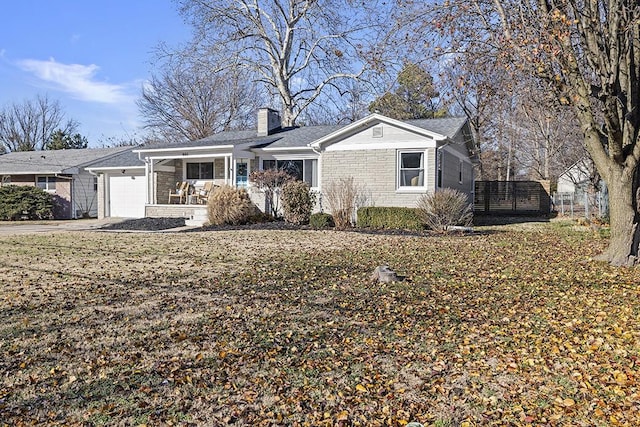 ranch-style home with a garage