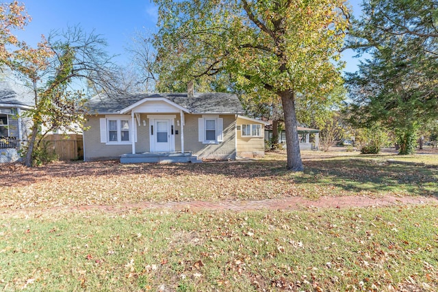 view of front of home with a front yard