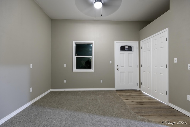 entrance foyer featuring hardwood / wood-style floors and ceiling fan