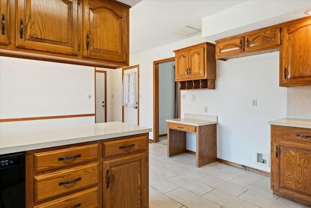 kitchen featuring dishwasher