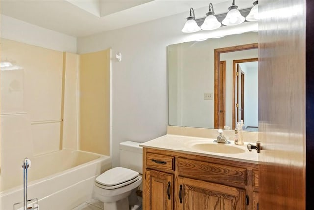 full bathroom featuring tile patterned floors, vanity, toilet, and shower / washtub combination