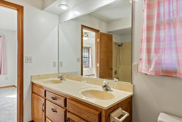 bathroom featuring vanity and ceiling fan