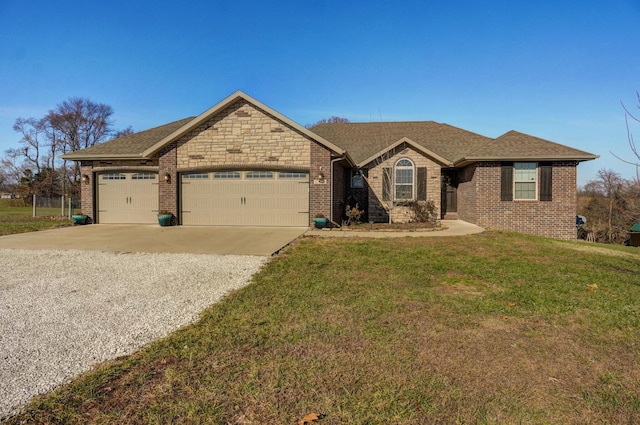 ranch-style home with a front lawn and a garage