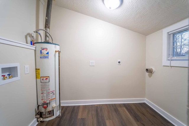 utility room featuring gas water heater