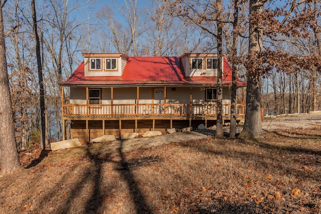 view of front of house featuring a wooden deck