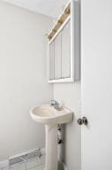 9800 Red Spring Rd, Mountain Grove, MO 65711 - bathroom featuring baseboards