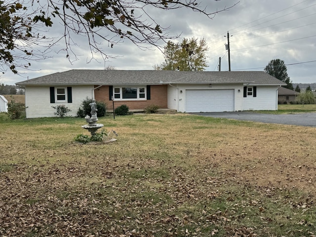 9800 Red Spring Rd, Mountain Grove, MO 65711 - ranch-style home with an attached garage, a front lawn, driveway, and brick siding