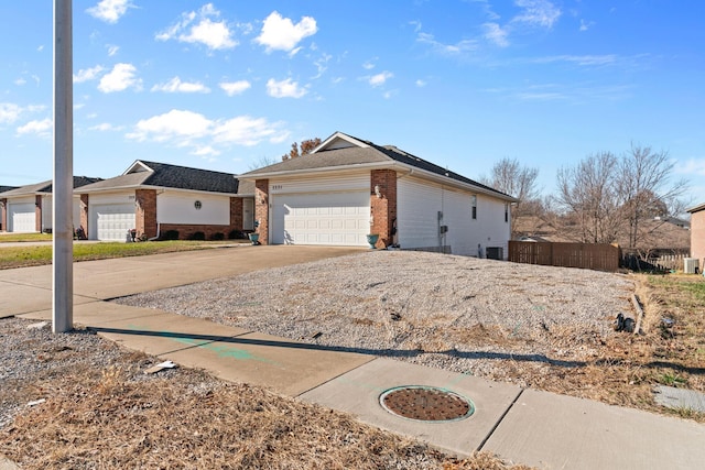 ranch-style house featuring a garage