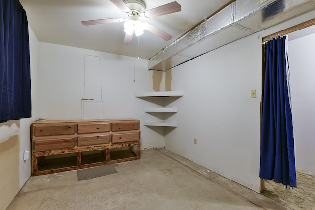 basement featuring ceiling fan