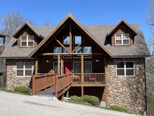 cabin featuring a porch