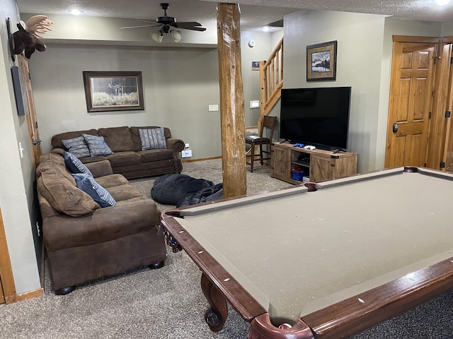 living room with carpet flooring, a textured ceiling, and billiards