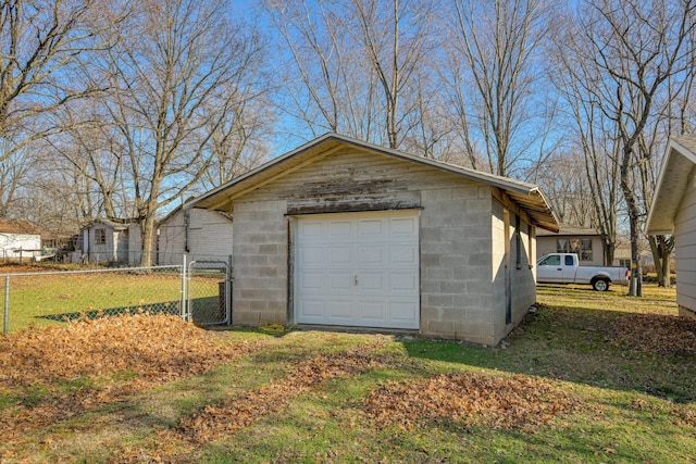 garage with a yard