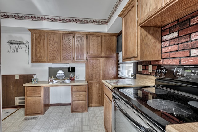 kitchen with black / electric stove