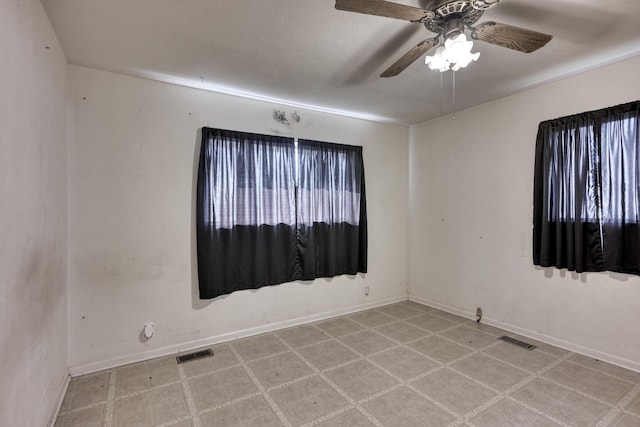 empty room with ceiling fan